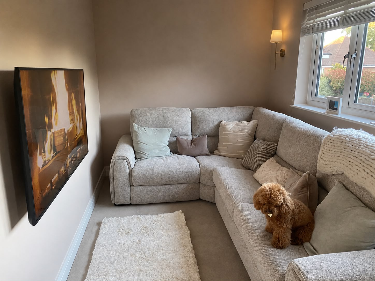Completed television wall mounting with a clean, level finish
