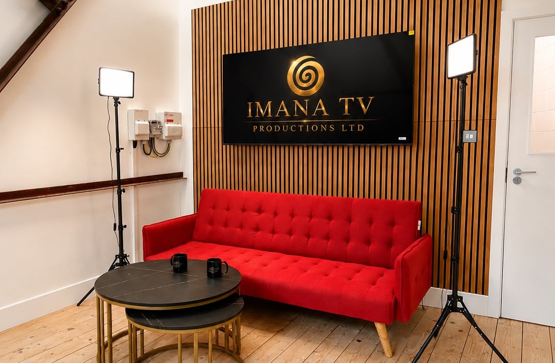 Completed acoustic slat feature wall and wall-mounted display